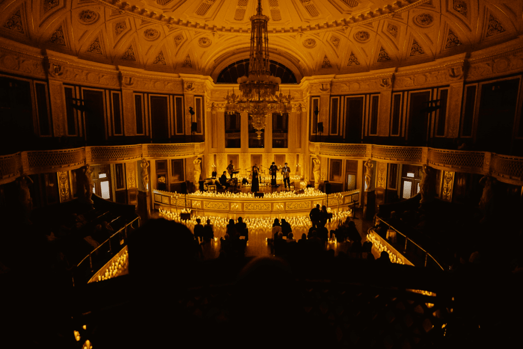 A string quartet performing on a grand stage at St George's Hall.