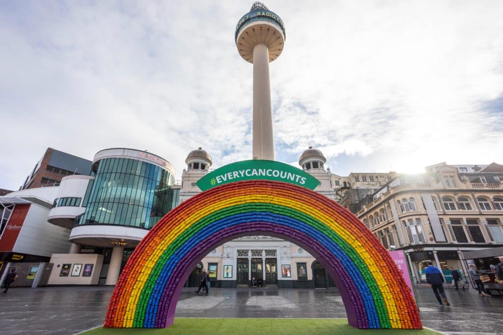 A large rainbow made from recycled cans in Liverpool city centre.