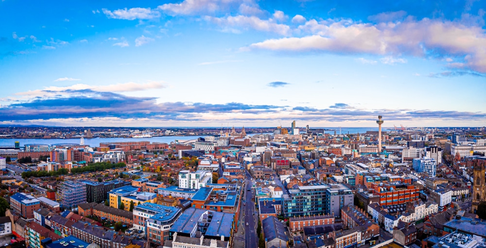 An aerial view of Liverpool with a blue sky.