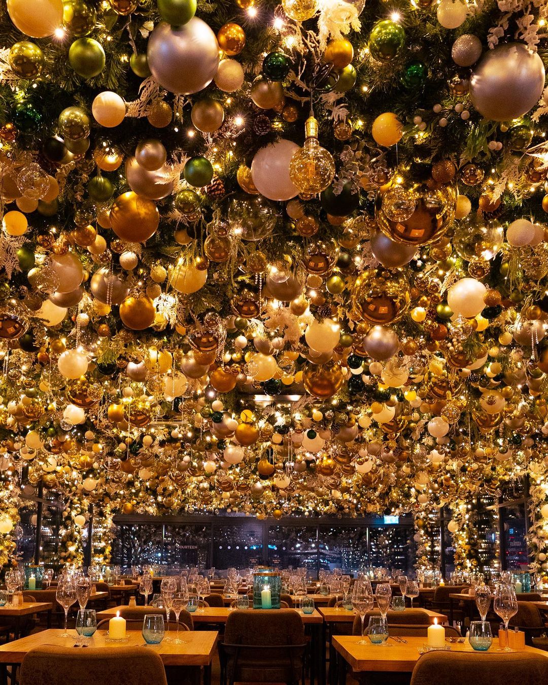 A restaurant with 50,000 illuminates baubles on the ceiling at 14 Bar & Grill.