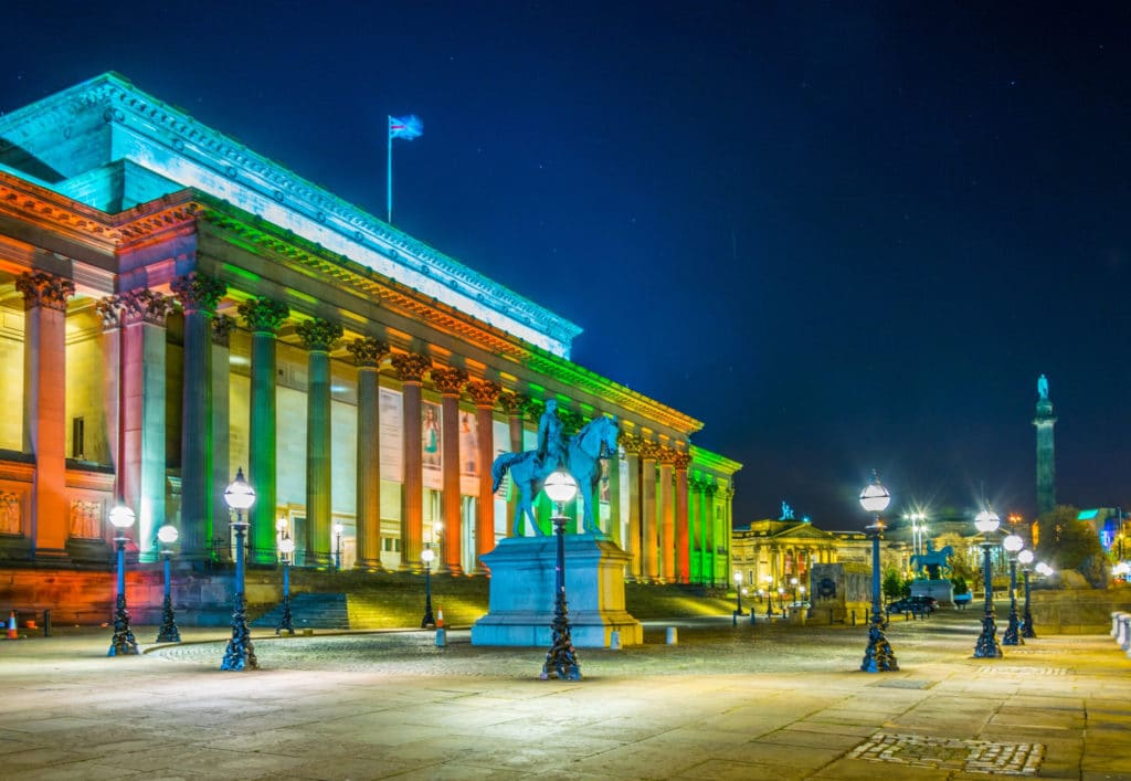 St. George's Hall in Liverpool, illuminated in rainbow colours.